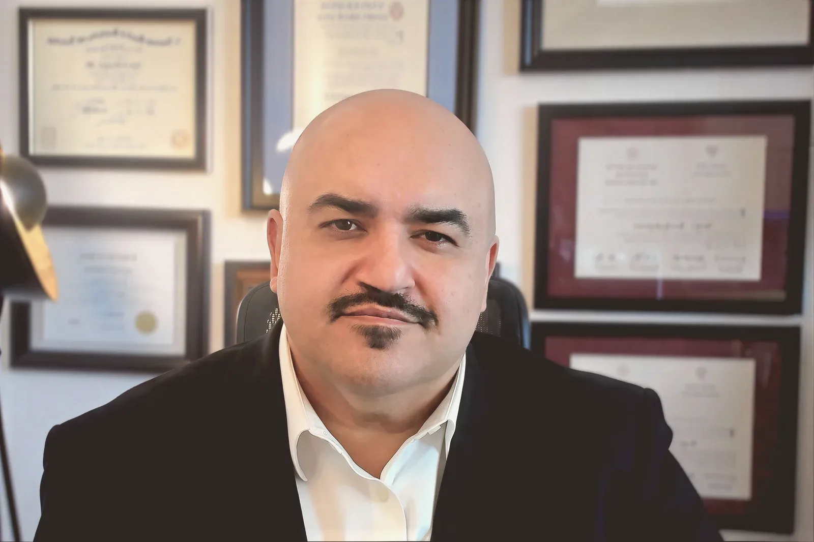 Dr. Angelo Sadeghpour in his office